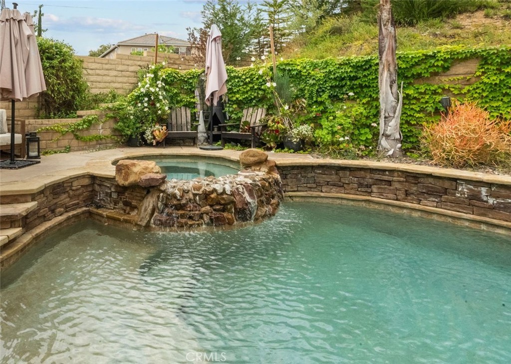 19969 Via Joyce Drive Saugus, CA 91350 - Photo 63 of 66 a view of a swimming pool with a patio