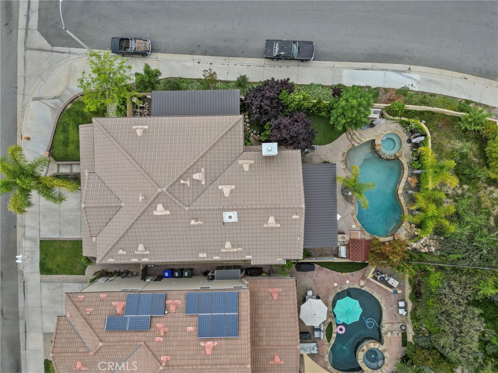 19969 Via Joyce Drive Saugus, CA 91350 - Photo 65 of 66 an aerial view of a house with a swimming pool