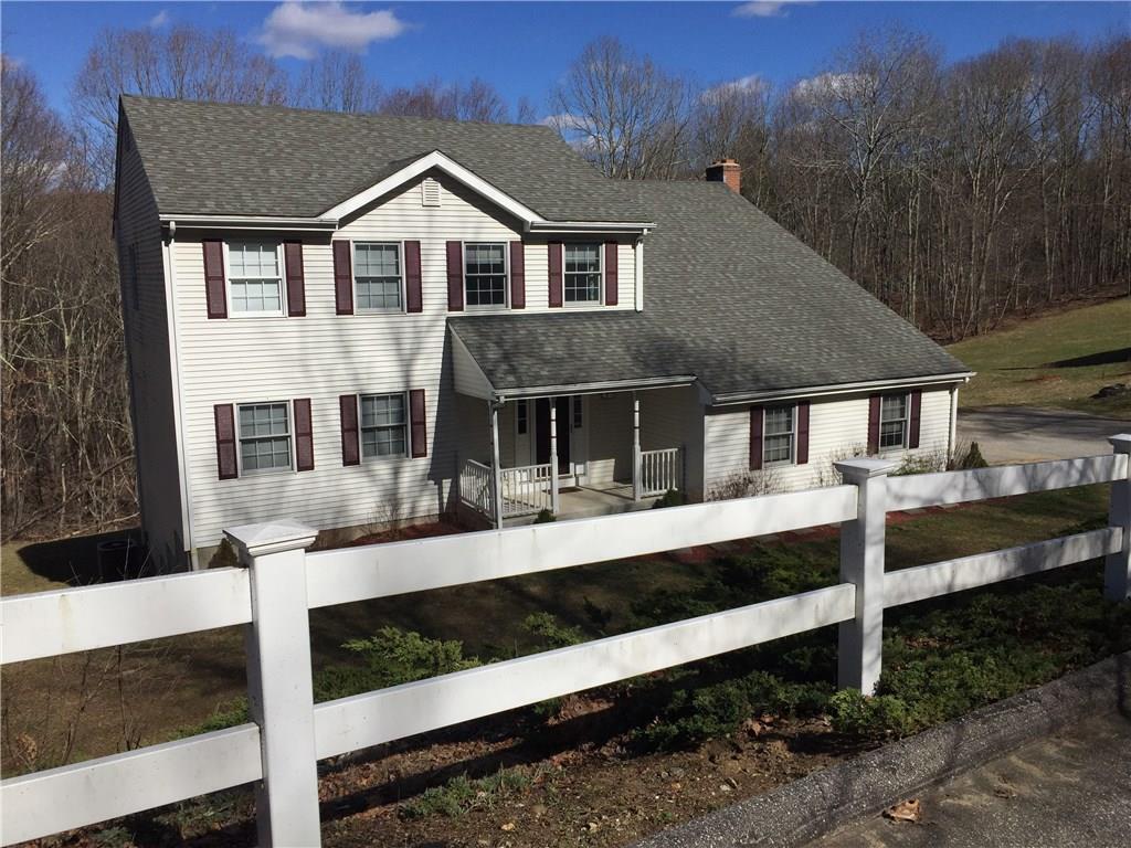 136 Pinebrook Road Colchester, CT 06415 - Photo 1 of 1 a front view of a house with a yard