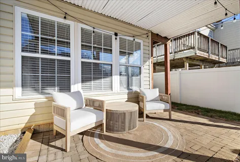 a front view of a house with glass windows