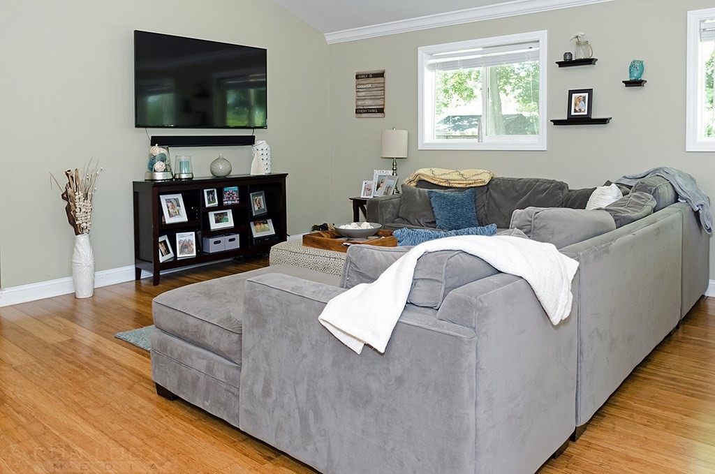 25 Cherry Road Framingham, MA 01701 - Photo 13 of 14 a living room with furniture and a flat screen tv
