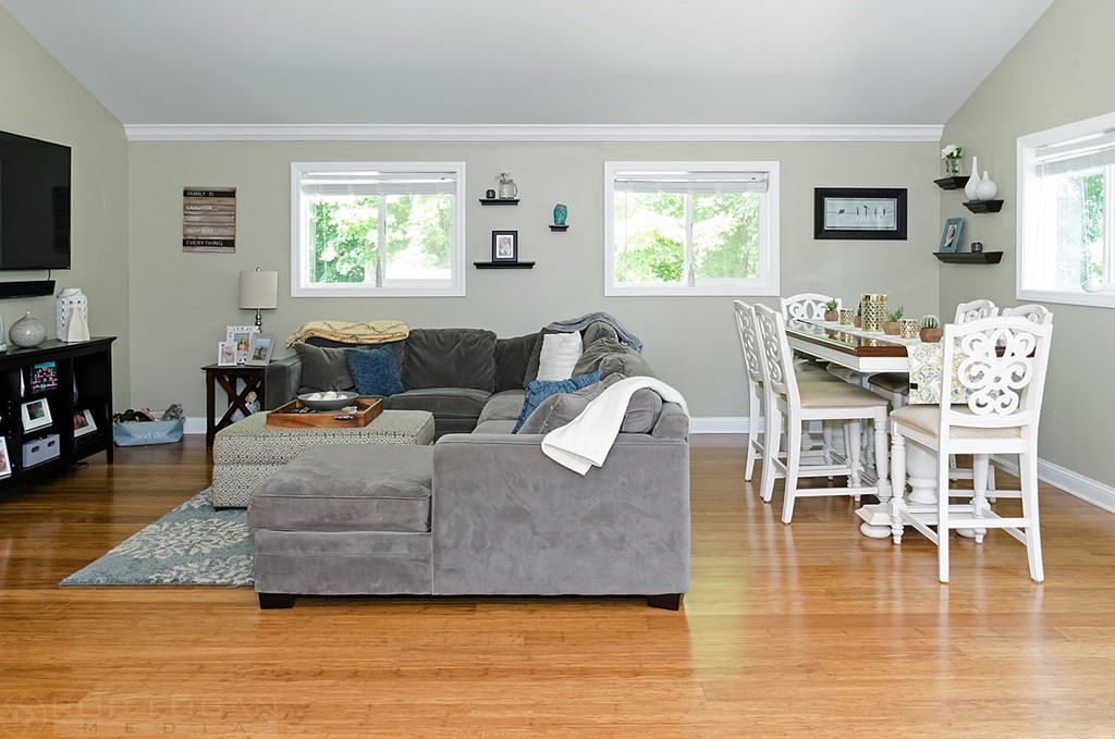 25 Cherry Road Framingham, MA 01701 - Photo 5 of 14 a living room with furniture wooden floor and a flat screen tv