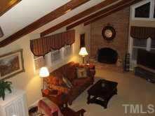 11204 Coachmans Way Raleigh, NC 27614 - Photo 2 of 10 a living room with furniture and a fireplace