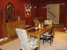 11204 Coachmans Way Raleigh, NC 27614 - Photo 4 of 10 a view of a dining room with furniture and wooden floor
