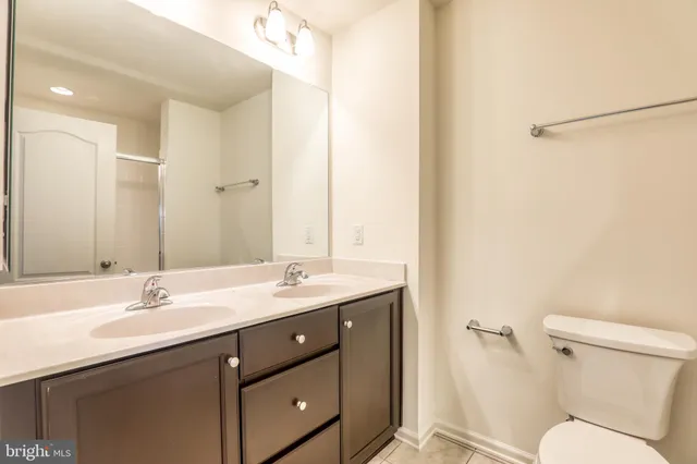 a view of a room with a window and a shower
