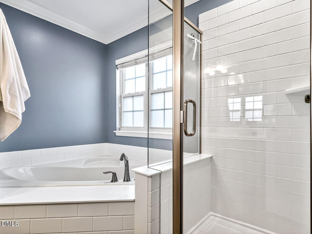 422 Intern Way Durham, NC 27713 - Photo 22 of 33 a bathroom with a bathtub and a shower