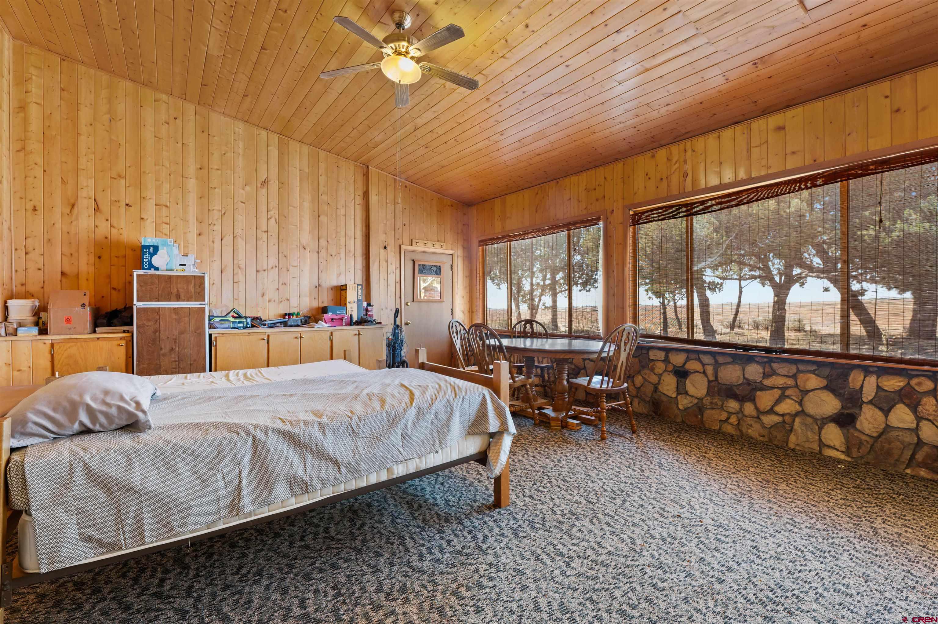 106 County Road 106 Hesperus, CO 81326 - Photo 35 of 44 a bedroom with a bed and a large window