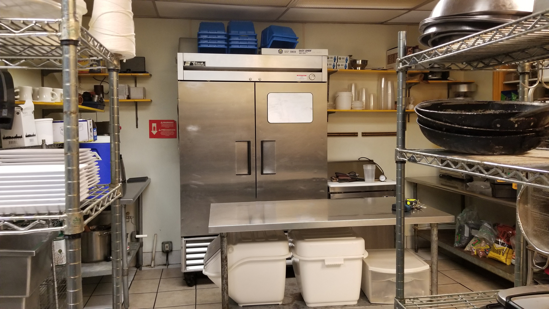 3404 North Halsted Street Chicago, IL 60657 - Photo 4 of 6 a kitchen with a stove and a refrigerator