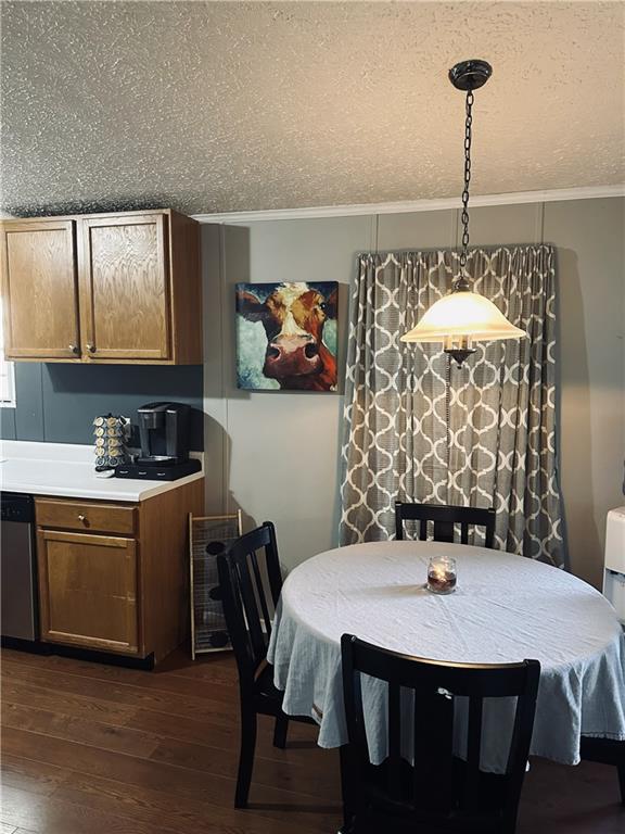 6675 Millwood Road Gainesville, GA 30506 - Photo 6 of 13 a kitchen with a table chairs and white cabinets