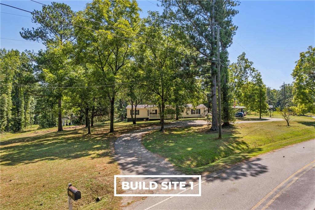6675 Millwood Road Gainesville, GA 30506 - Photo 9 of 13 a view of a park that has large trees