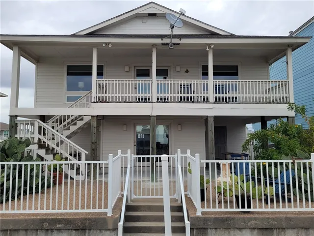 a front view of a house with a porch