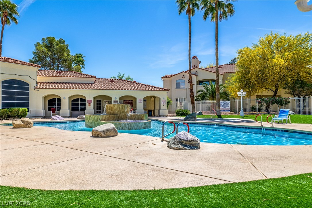 698 South Racetrack Road, Unit 124 Henderson, NV 89015 - Photo 29 of 29 Community pool featuring a patio area