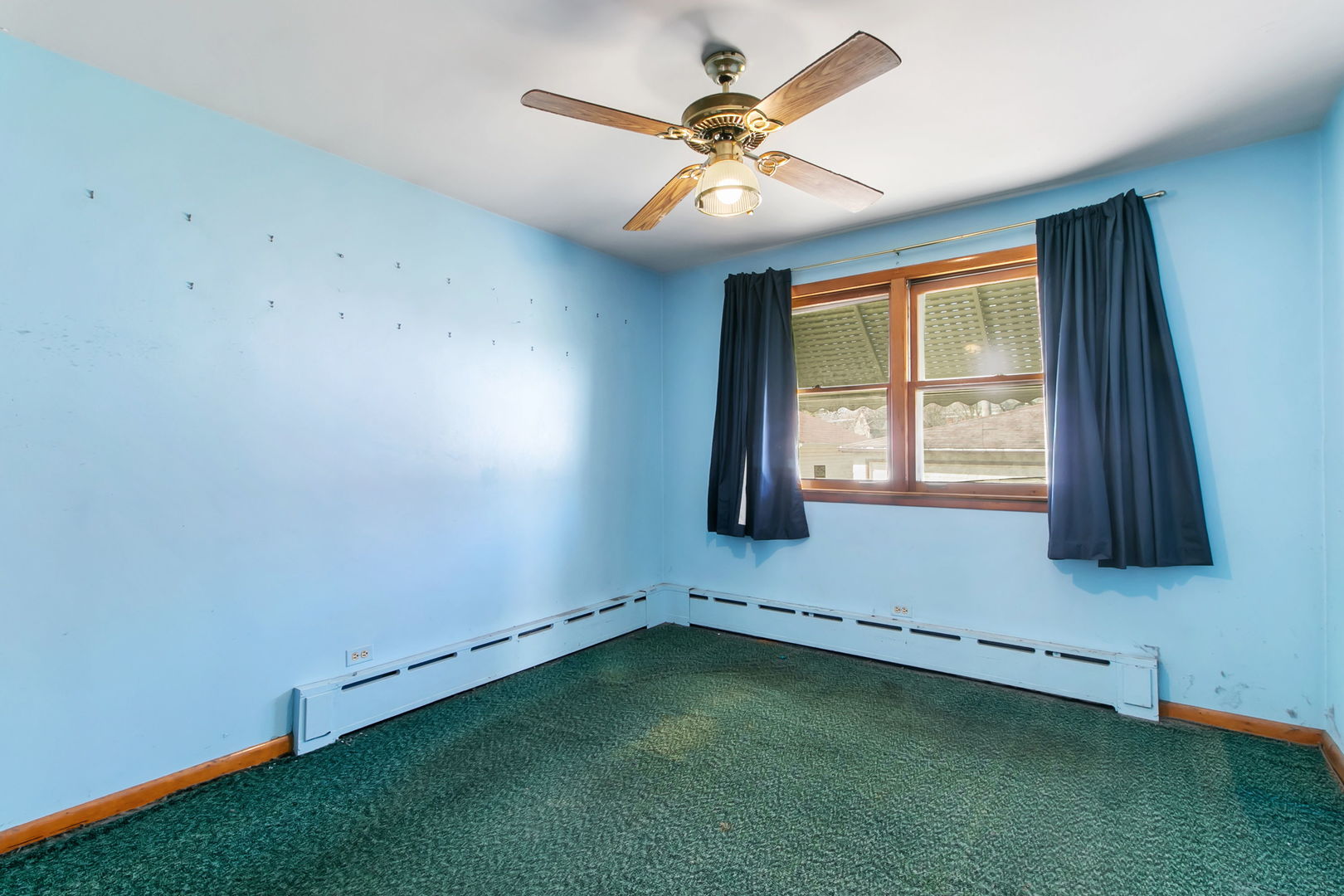 388 Shenstone Road Riverside, IL 60546 - Photo 6 of 29 an empty room with a window