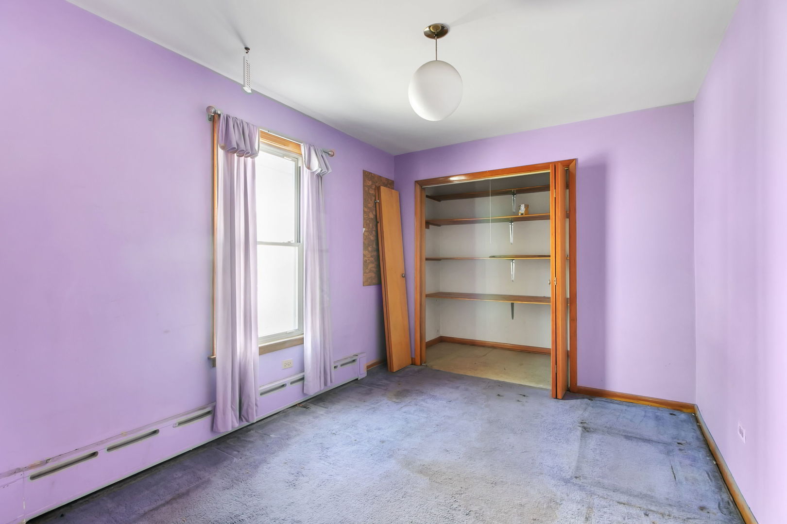 388 Shenstone Road Riverside, IL 60546 - Photo 7 of 29 a view of an empty room with a window