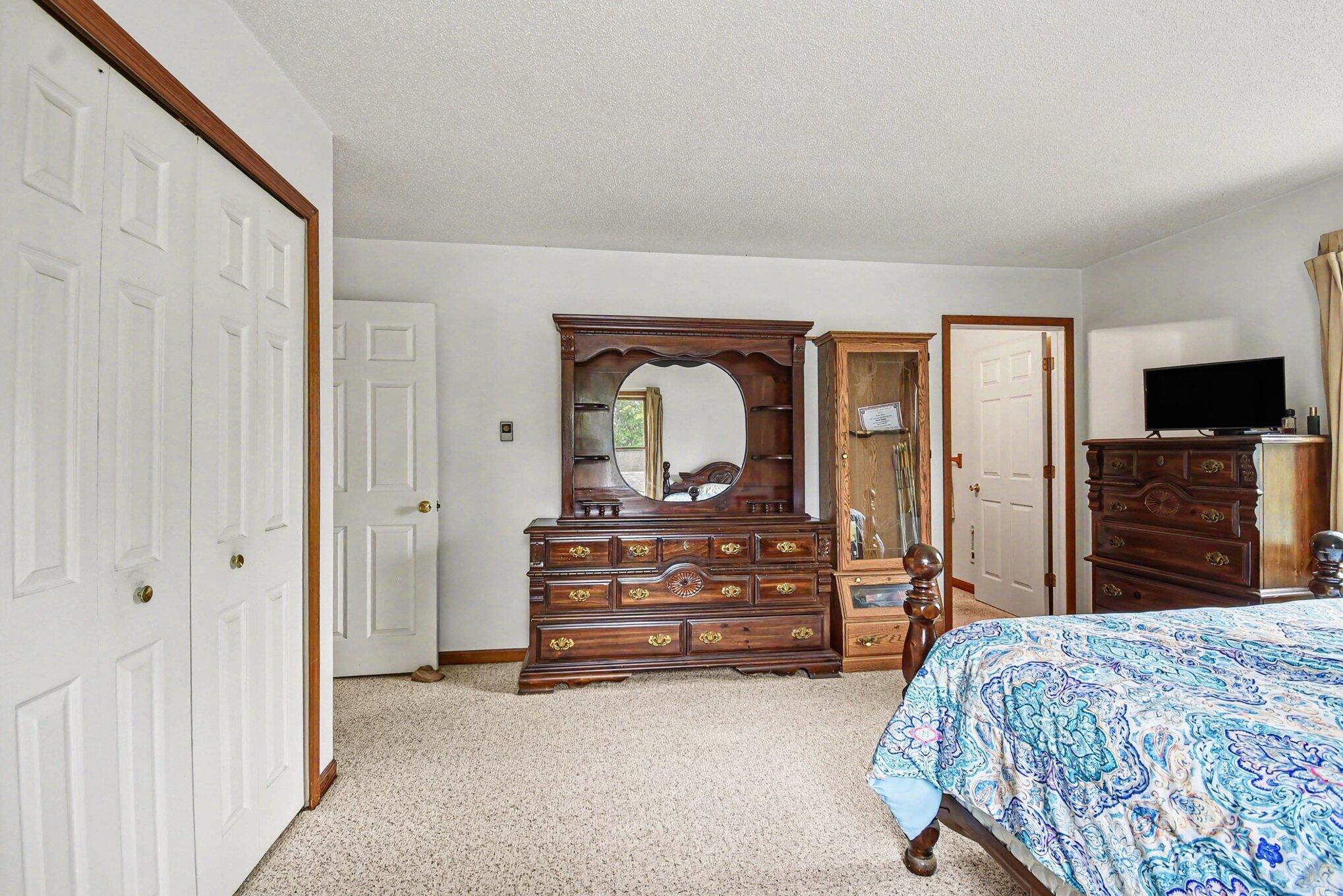 2675 West Lily Lake Road Harrison, MI 48625 - Photo 11 of 29 Primary Bedroom