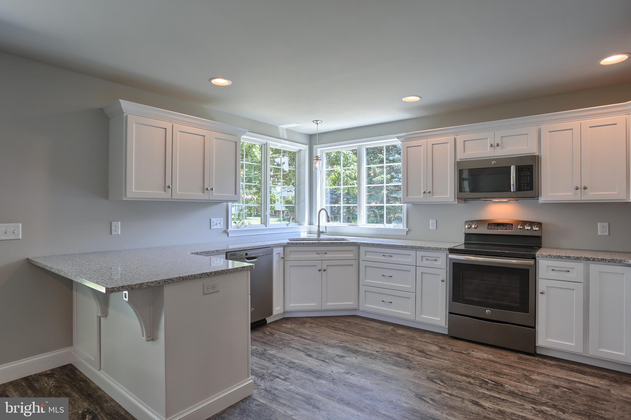 10 Rolling Meadow Road Lebanon, PA 17046 - Photo 12 of 29 a kitchen with a sink stove top oven and cabinets