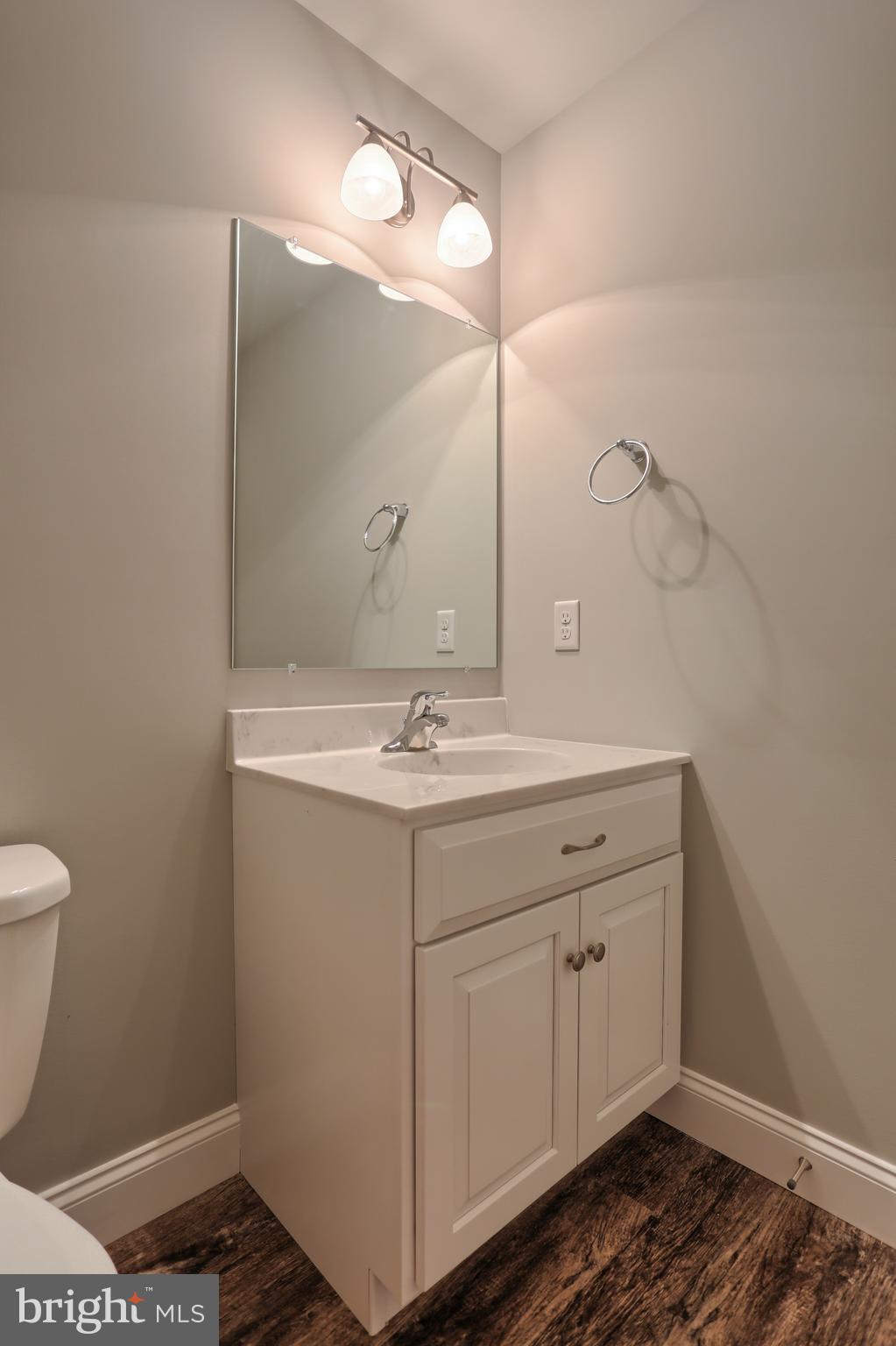 10 Rolling Meadow Road Lebanon, PA 17046 - Photo 17 of 29 a bathroom with a sink a toilet and vanity