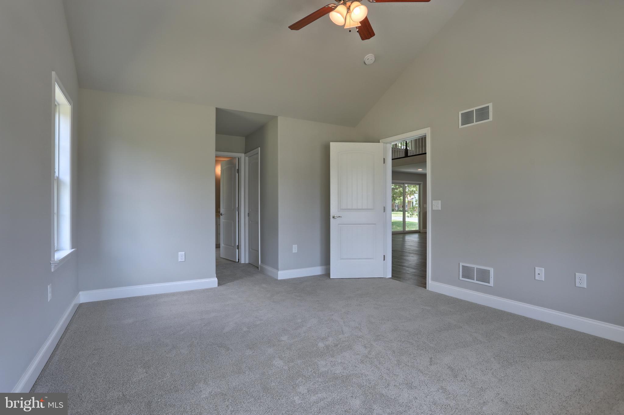 10 Rolling Meadow Road Lebanon, PA 17046 - Photo 20 of 29 a view of an empty room with chandelier fan