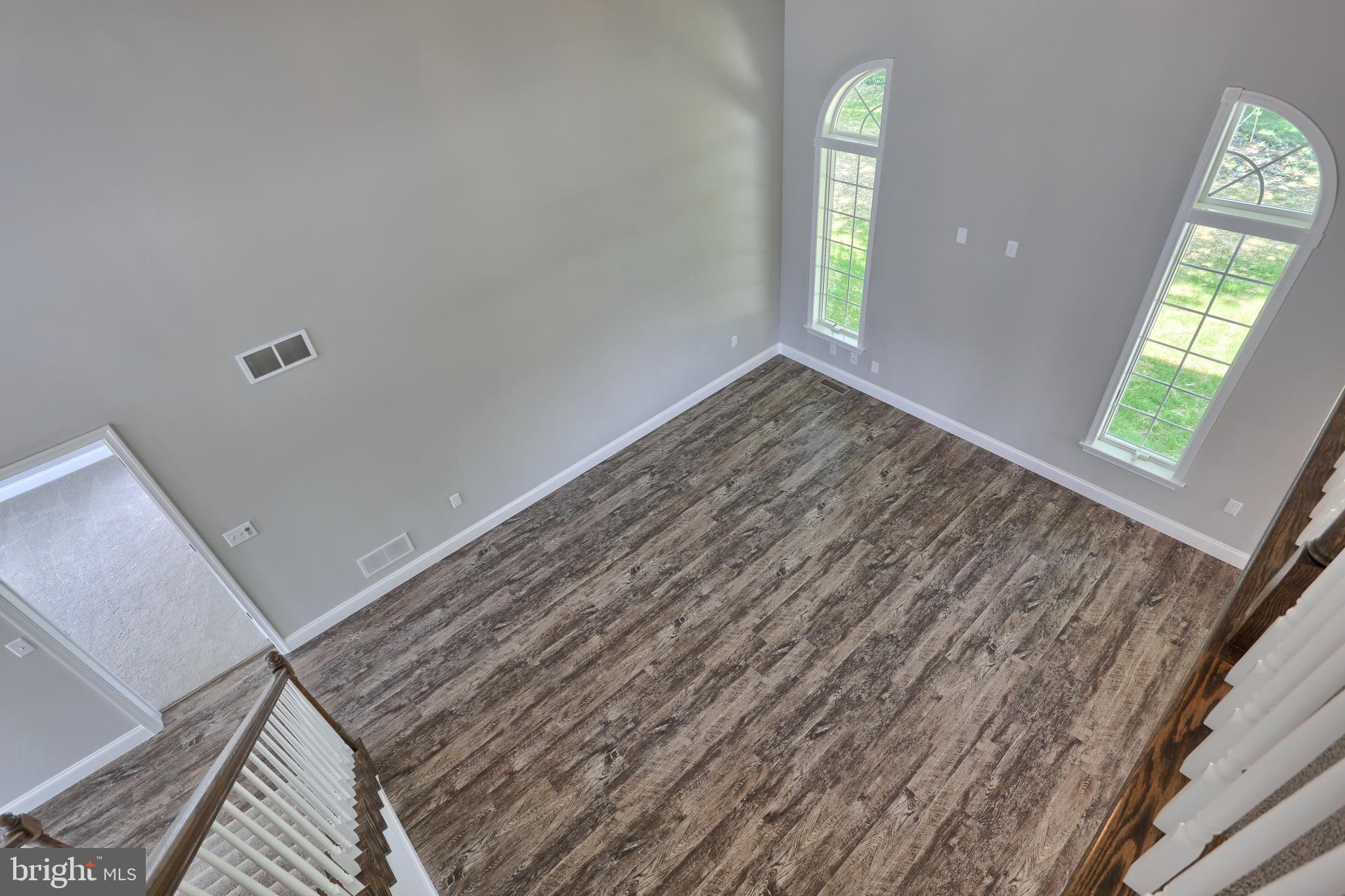 10 Rolling Meadow Road Lebanon, PA 17046 - Photo 23 of 29 wooden floor in an empty room with a window