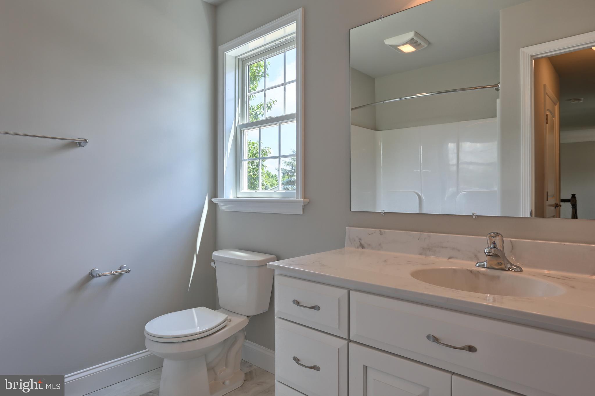 10 Rolling Meadow Road Lebanon, PA 17046 - Photo 29 of 29 a bathroom with a sink toilet and window