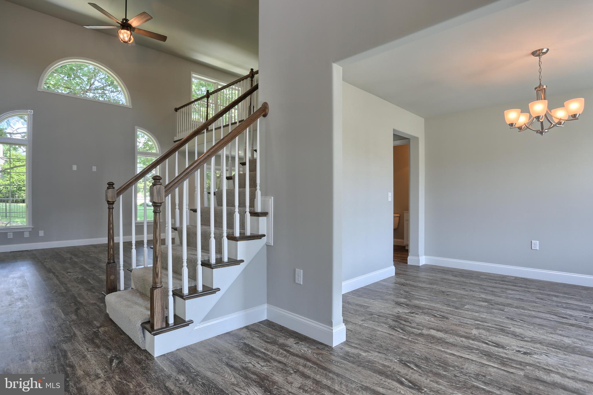 10 Rolling Meadow Road Lebanon, PA 17046 - Photo 3 of 29 a view of a hallway with wooden floor and staircase