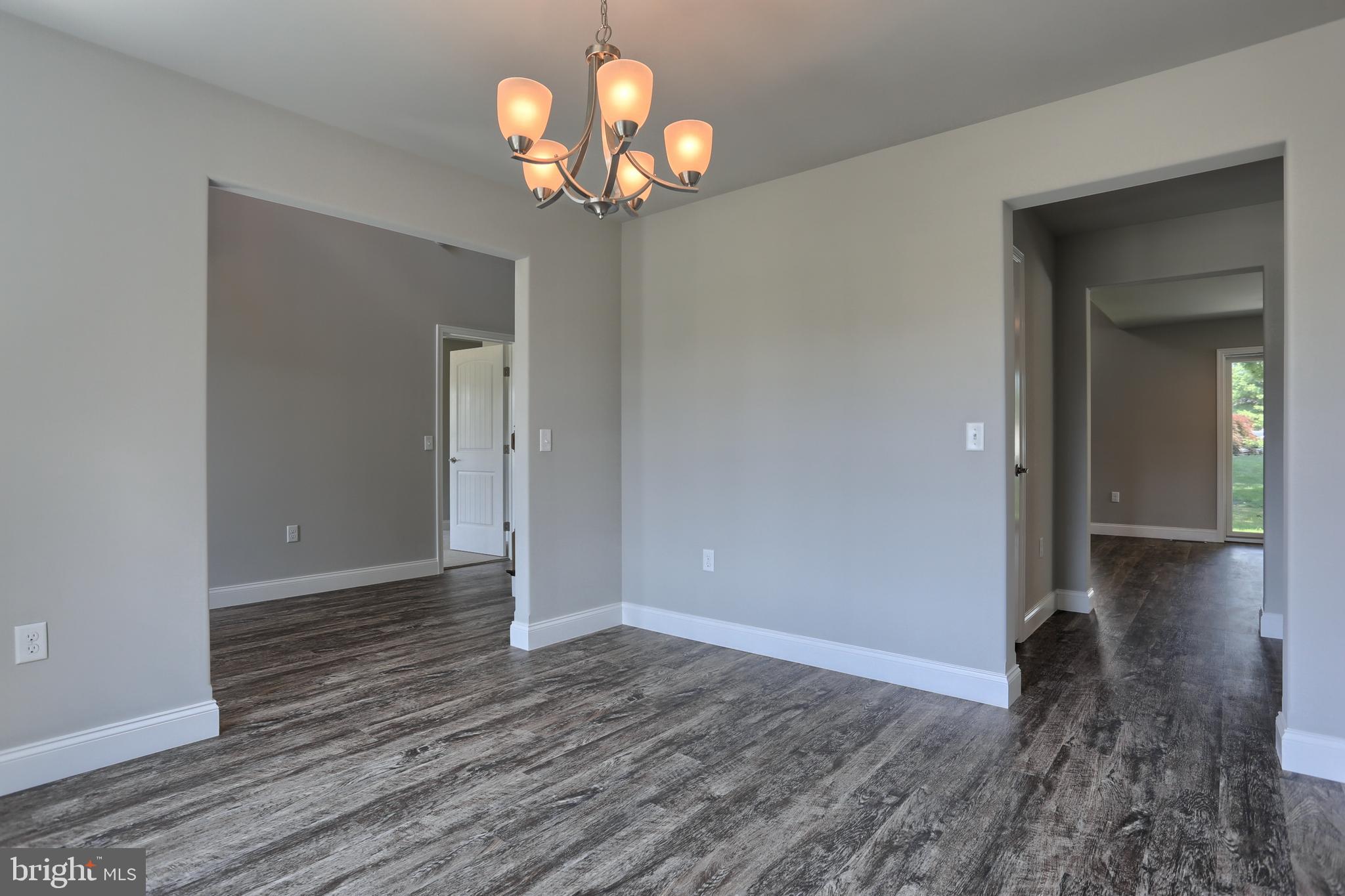 10 Rolling Meadow Road Lebanon, PA 17046 - Photo 5 of 29 wooden floor in an empty room with a window