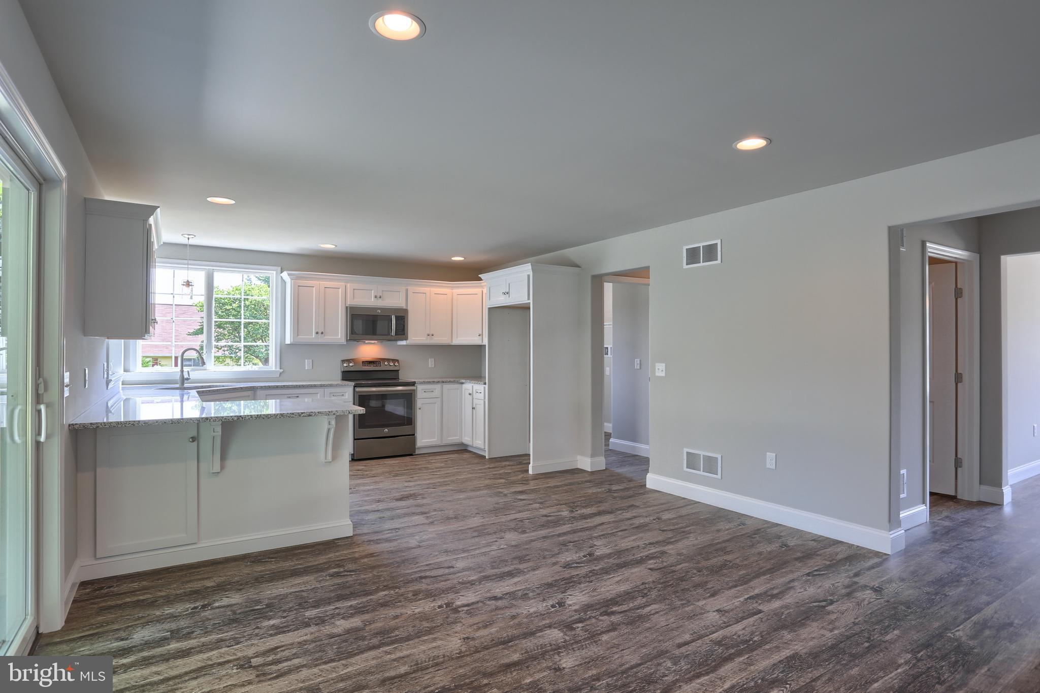 10 Rolling Meadow Road Lebanon, PA 17046 - Photo 10 of 29 a kitchen with stainless steel appliances a refrigerator and a stove top oven