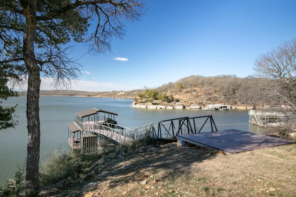 167 Cote D Azur Chico, TX 76431 - Photo 21 of 35 a view of a terrace with a table and chairs