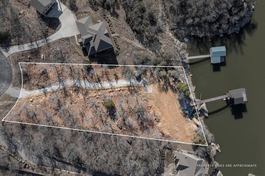 167 Cote D Azur Chico, TX 76431 - Photo 6 of 35 an aerial view of a house
