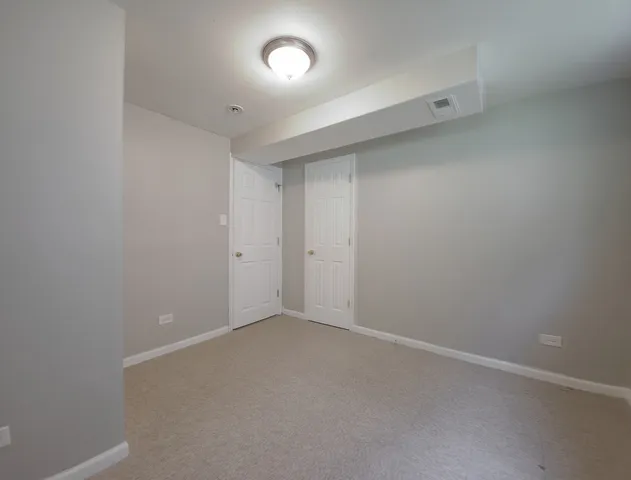 an empty room with an entryway