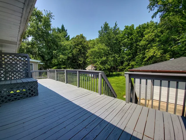 a view of deck with a garden
