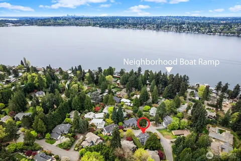 a view of a lake with a house in the background