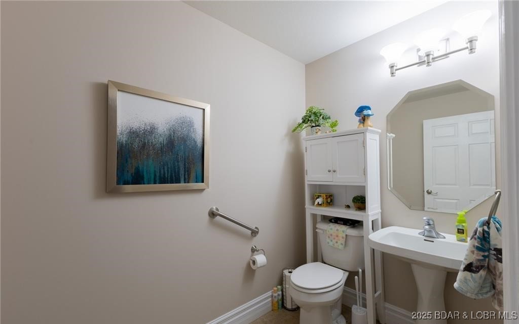 4331 Sunset Drive, Unit B Osage Beach, MO 65065 - Photo 19 of 36 Half bath