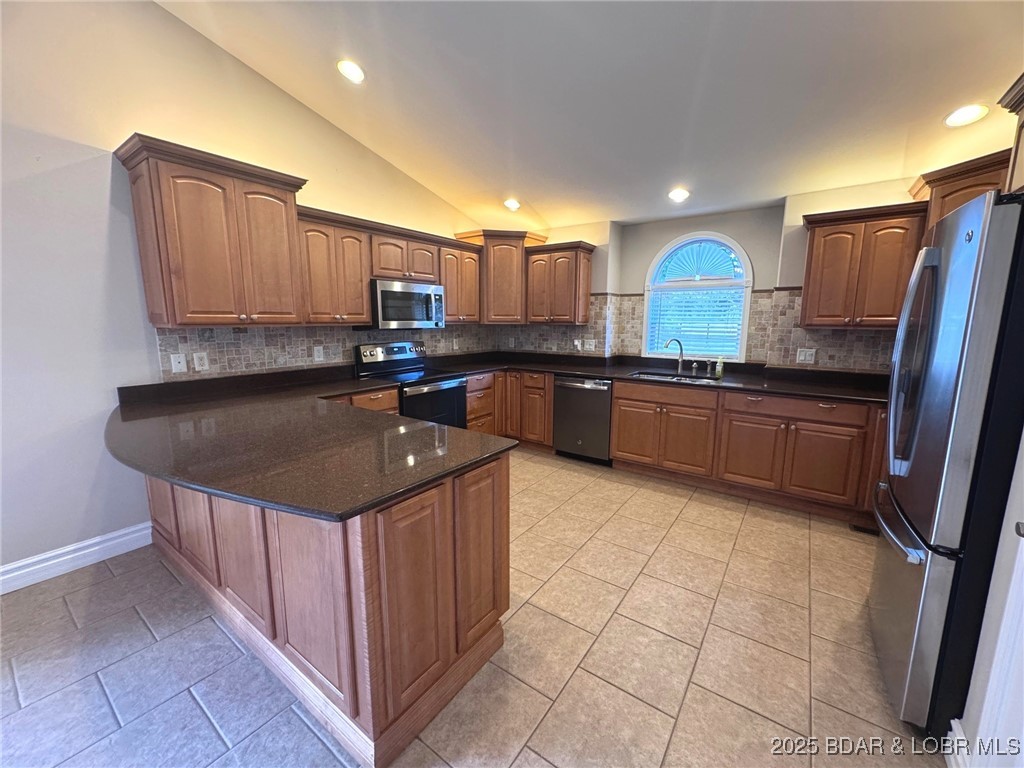 4331 Sunset Drive, Unit B Osage Beach, MO 65065 - Photo 8 of 36 Open concept kitchen-Lots of cabinets and countert