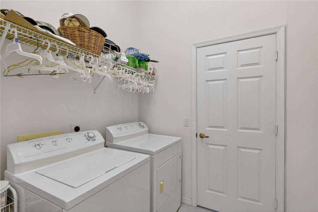 3075 73rd Place Vero Beach, FL 32967 - Photo 17 of 30 a utility room with dryer and washer