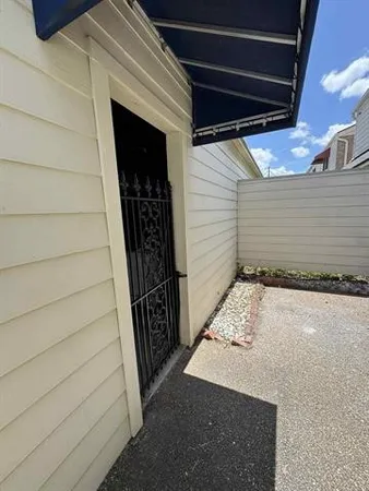 an empty room with a ceiling fan