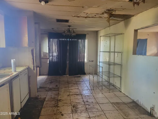 a view of a hallway with a chandelier