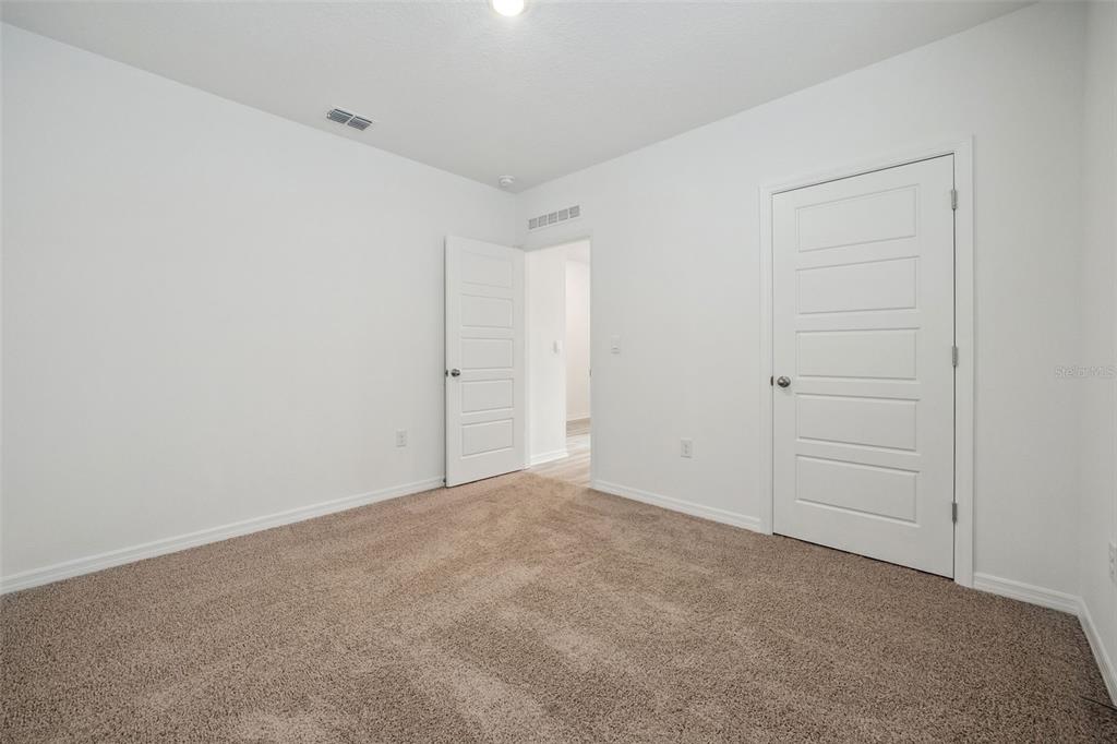 3515 Nettle Loop Tavares, FL 32778 - Photo 17 of 58 a view of an empty room
