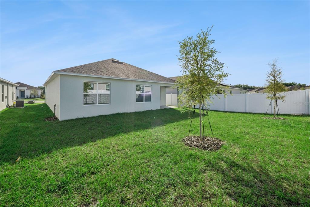 3515 Nettle Loop Tavares, FL 32778 - Photo 29 of 58 a house view with a garden space