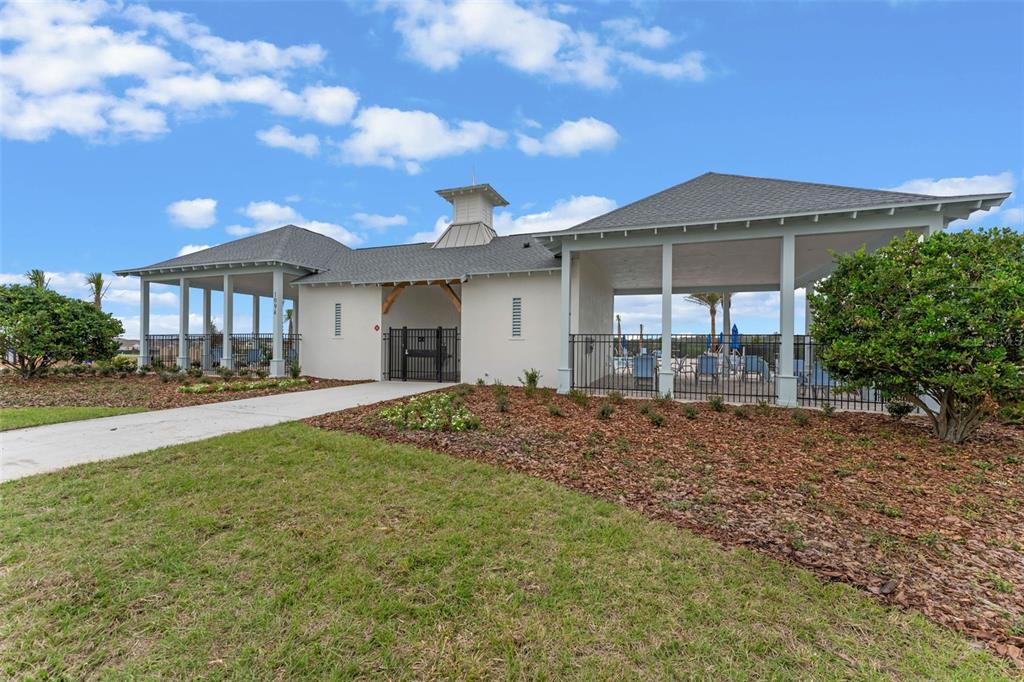 3515 Nettle Loop Tavares, FL 32778 - Photo 43 of 58 a view of a house with backyard and porch