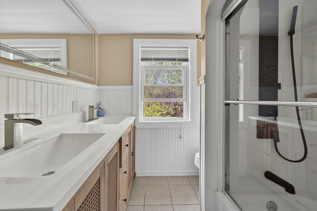 229 Parkerville Road Southborough, MA 01772 - Photo 17 of 38 a bathroom with a sink and a shower