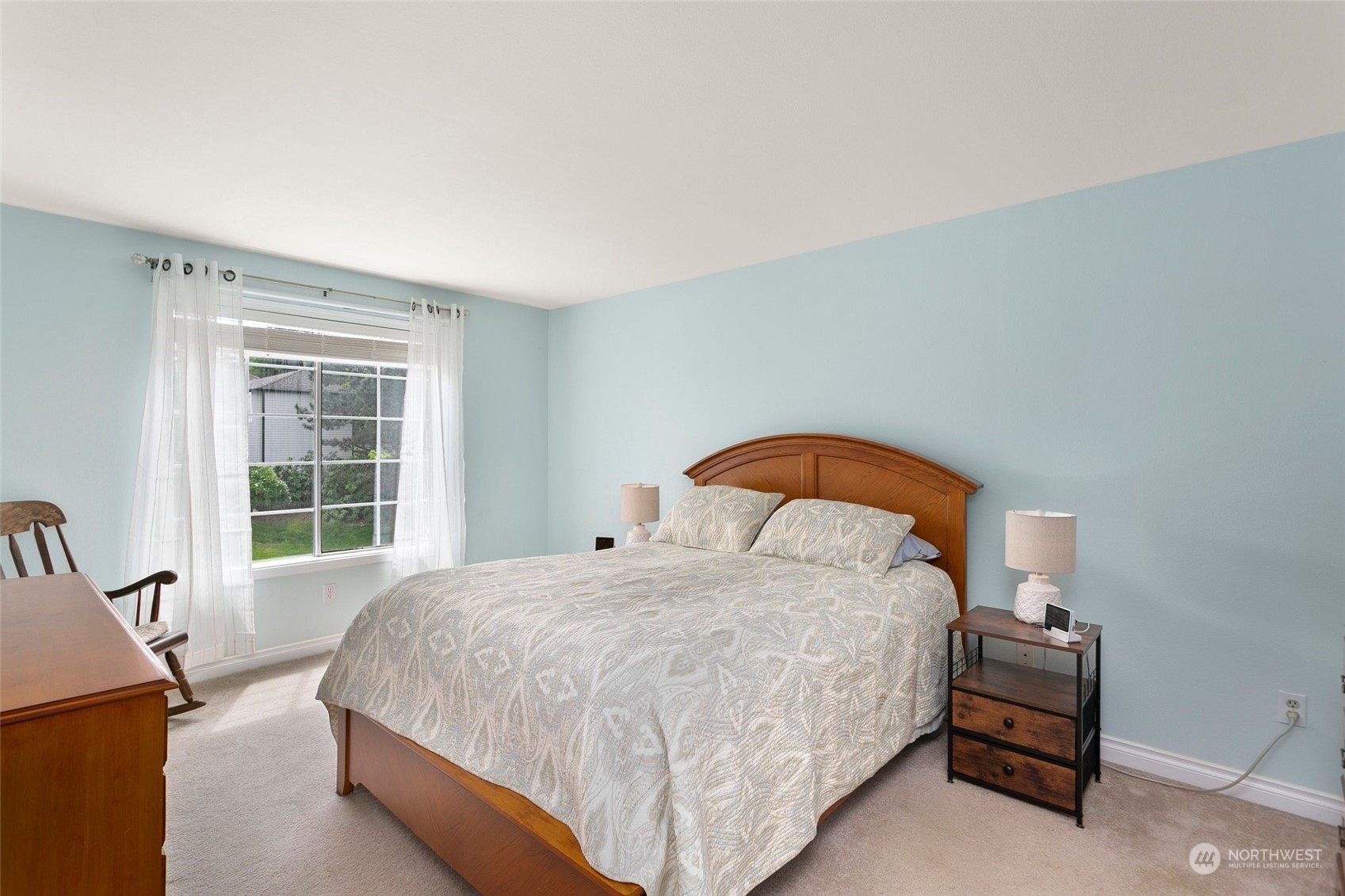 1915 235th Street Southeast Bothell, WA 98021 - Photo 21 of 33 a bedroom with a bed and a window