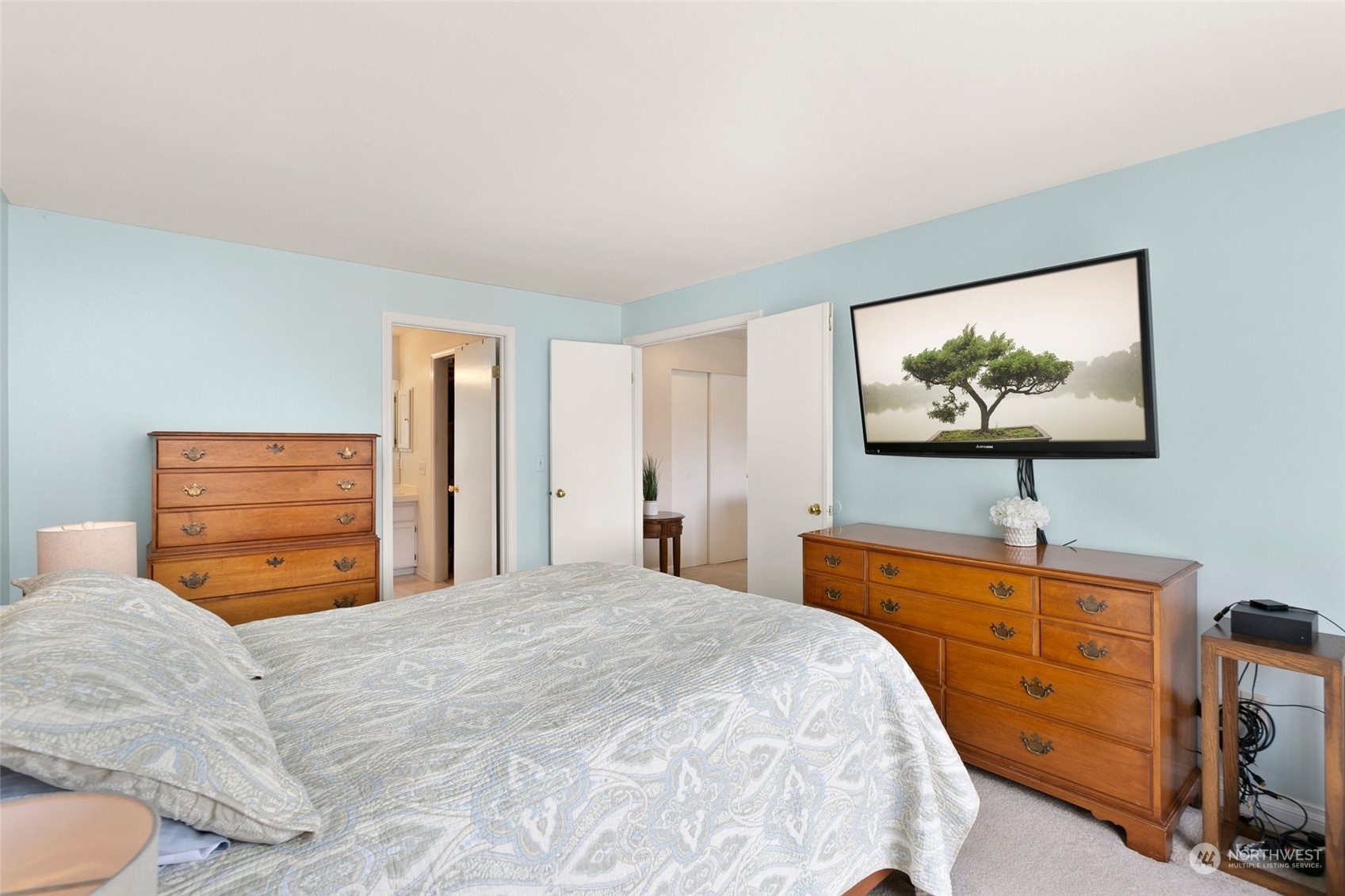 1915 235th Street Southeast Bothell, WA 98021 - Photo 22 of 33 a bedroom with a bed and a flat screen tv