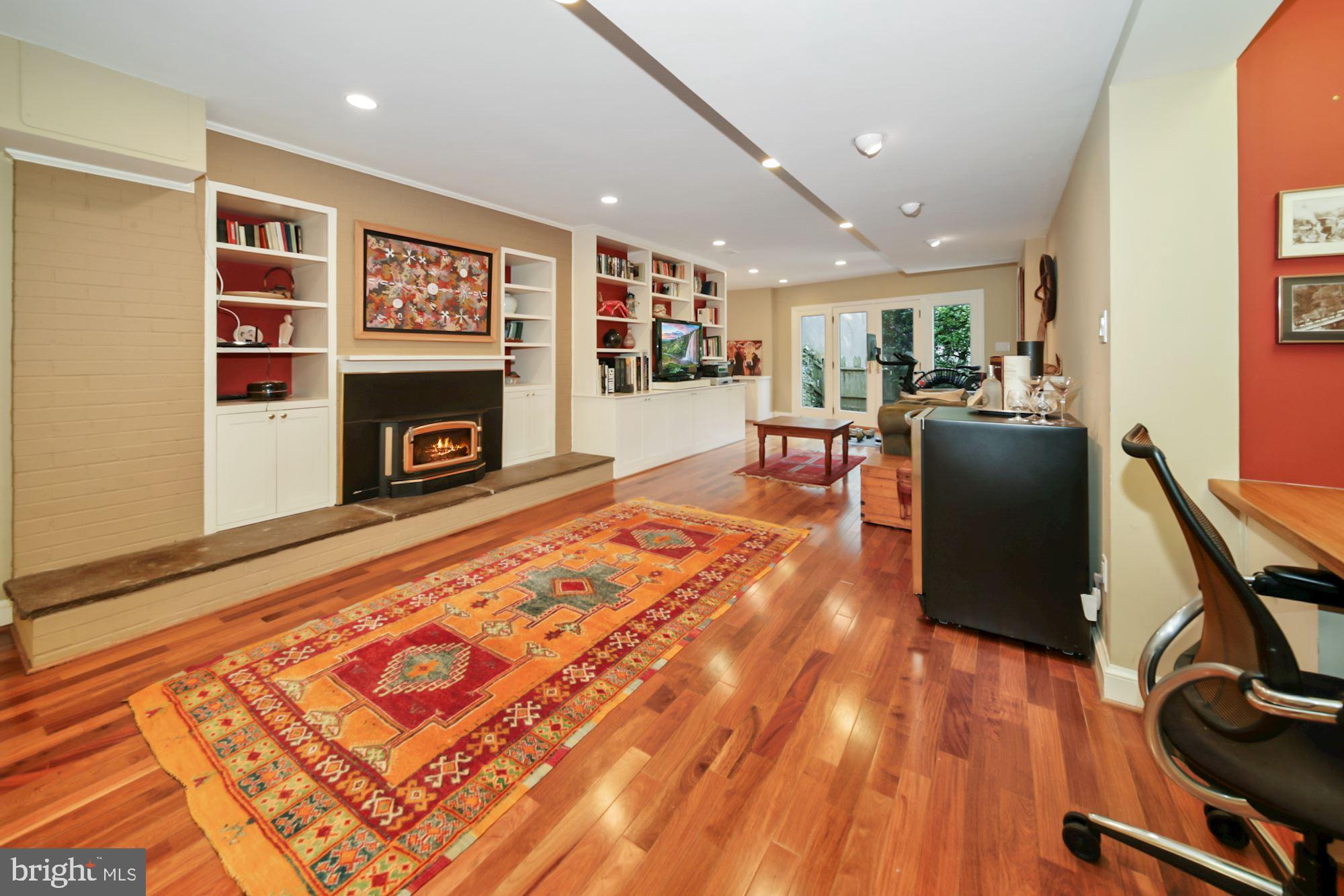 6002 Winnebago Road Bethesda, MD 20816 - Photo 31 of 54 Entry-level family room - cherry flooring