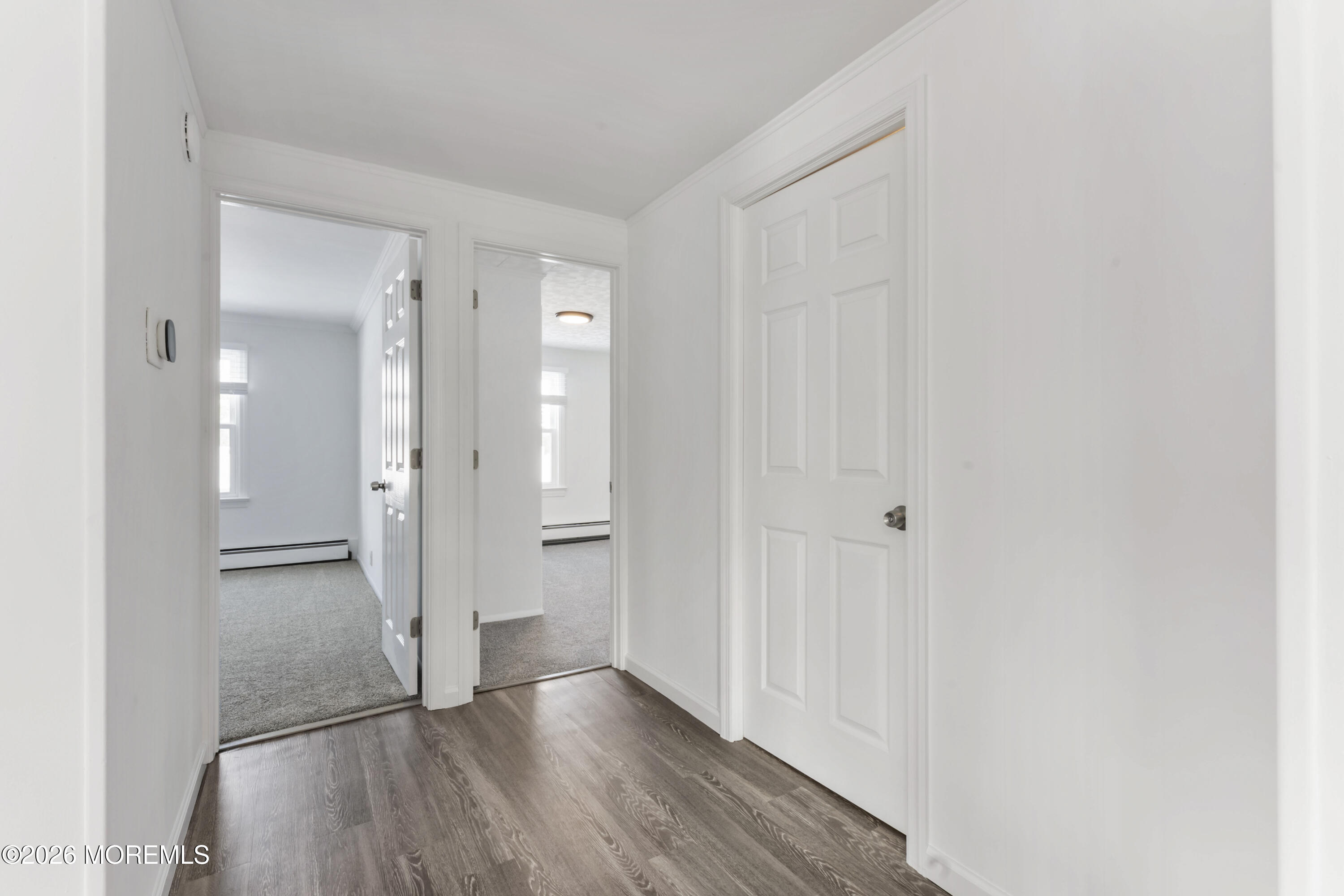 83 Chesterfield Jacobstown Road Wrightstown, NJ 08562 - Photo 15 of 52 a view of a hallway with wooden floor