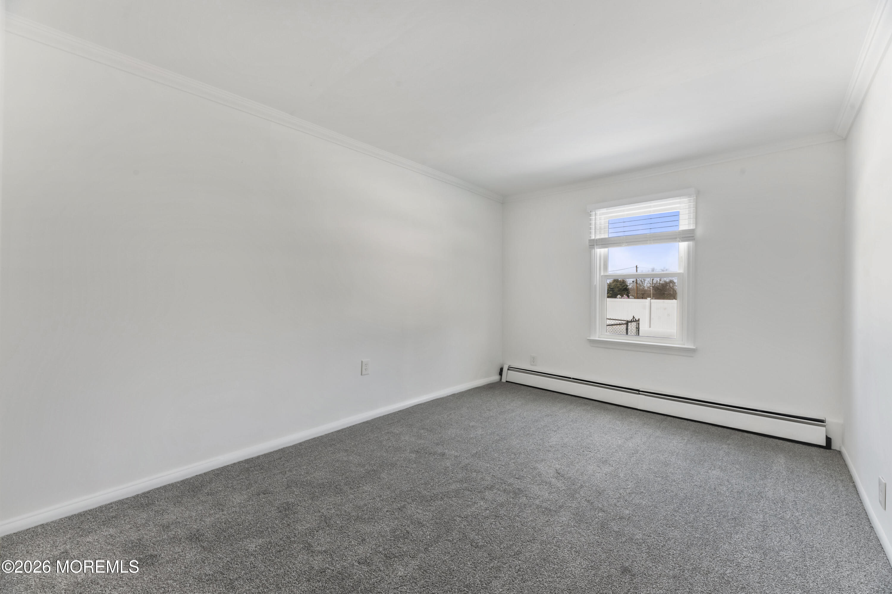 83 Chesterfield Jacobstown Road Wrightstown, NJ 08562 - Photo 21 of 52 an empty room with a window