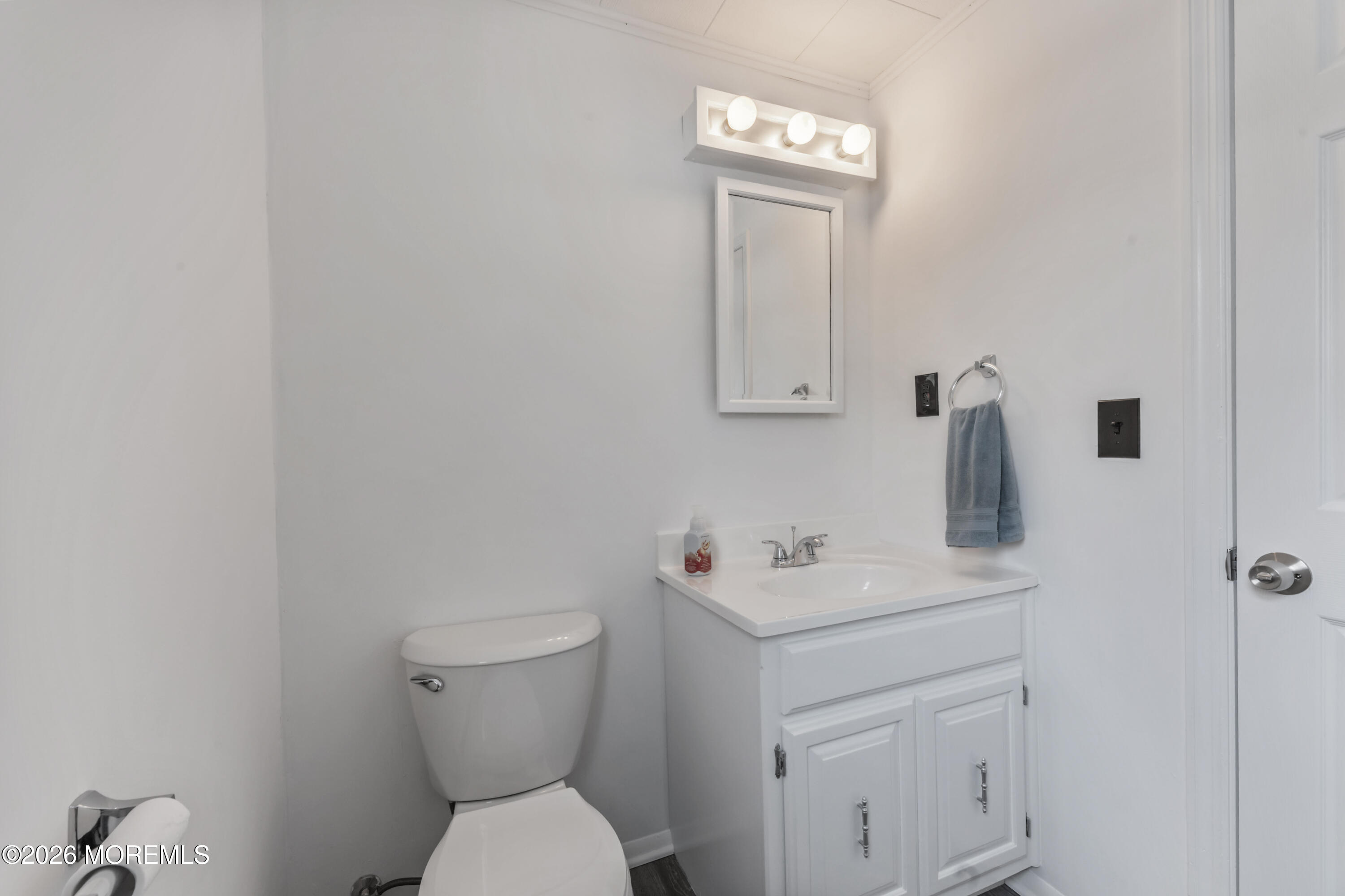 83 Chesterfield Jacobstown Road Wrightstown, NJ 08562 - Photo 24 of 52 a bathroom with a toilet sink and mirror