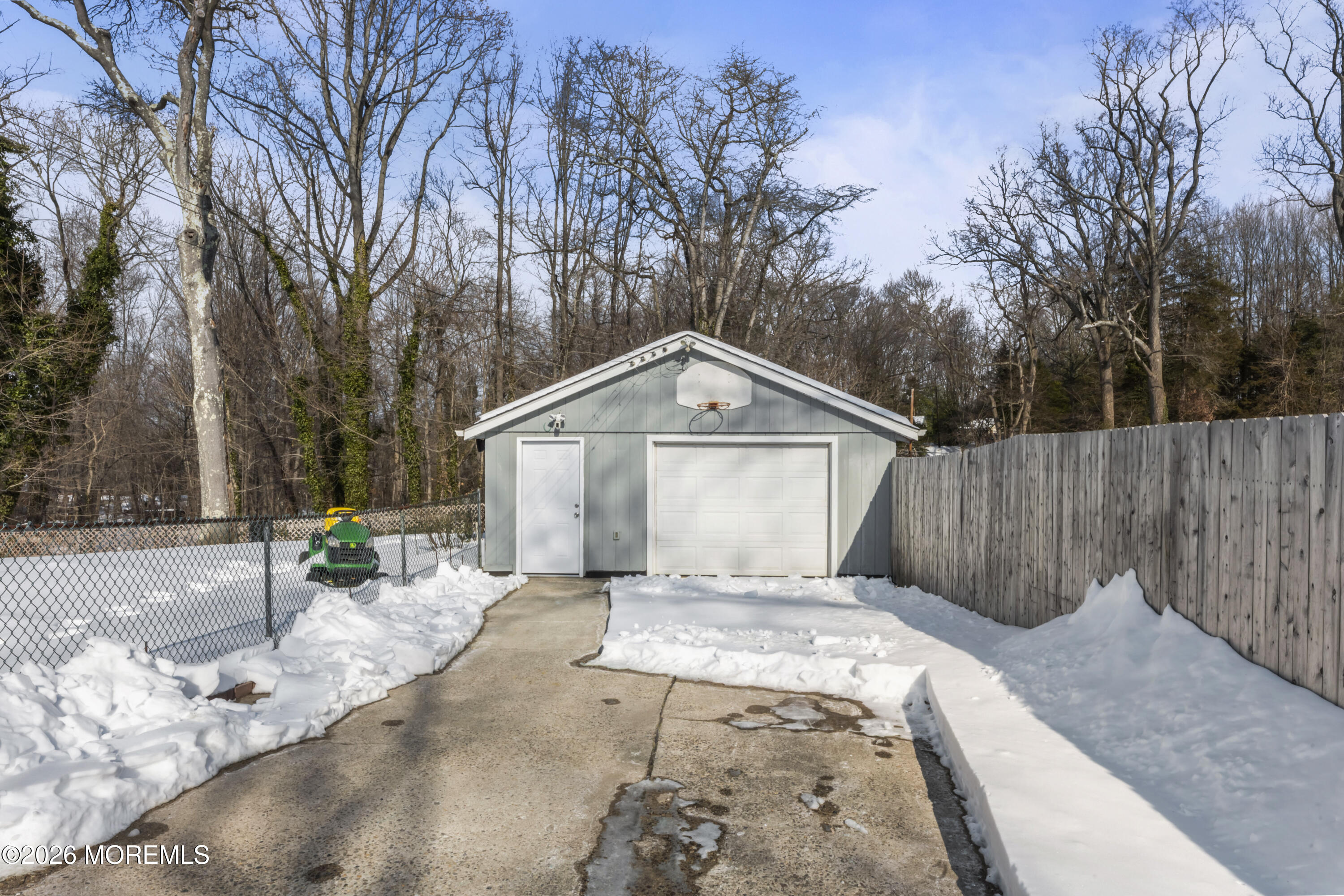 83 Chesterfield Jacobstown Road Wrightstown, NJ 08562 - Photo 28 of 52 a view of a house with a yard covered in snow