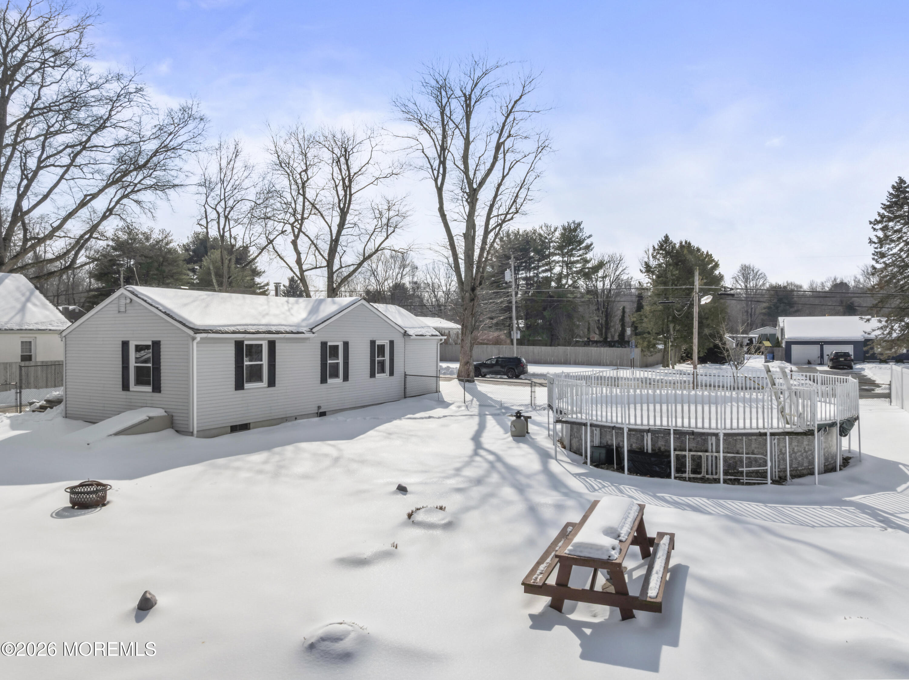 83 Chesterfield Jacobstown Road Wrightstown, NJ 08562 - Photo 33 of 52 a terrace of a house with yard and seating space