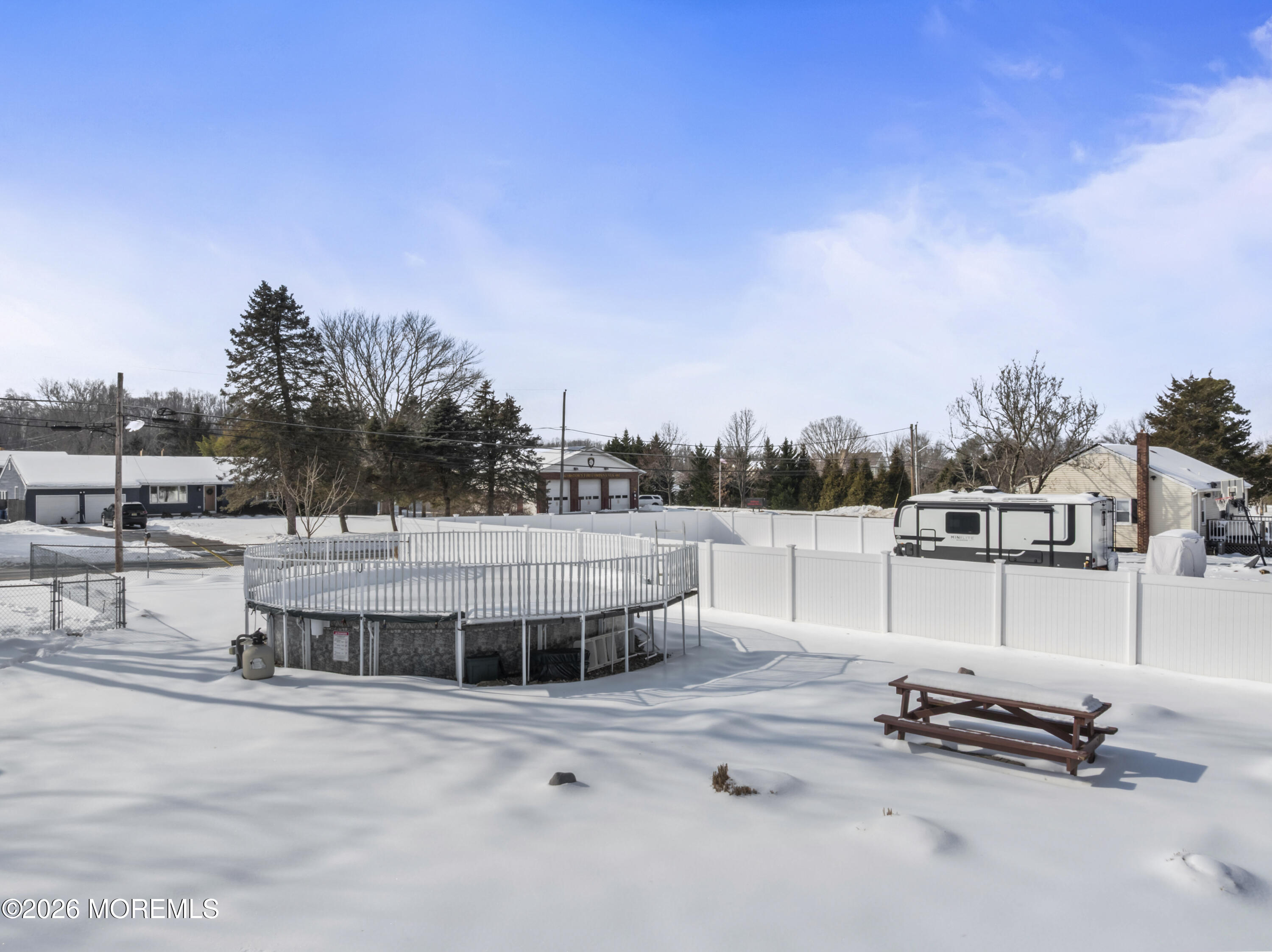 83 Chesterfield Jacobstown Road Wrightstown, NJ 08562 - Photo 35 of 52 a backyard of a house with table and chairs